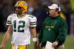 MINNEAPOLIS - NOVEMBER 09:  Quarterback Aaron Rodgers #12 and head coach Mike McCarthy of the Green Bay Packers confer against the Minnesota Vikings on November 9, 2008 at the Metrodome in Mineapolis, Minnesota.  The Vikings won 28-27.  (Photo by Stephen Dunn/Getty Images)