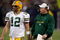 MINNEAPOLIS - NOVEMBER 09:  Quarterback Aaron Rodgers #12 and head coach Mike McCarthy of the Green Bay Packers confer against the Minnesota Vikings on November 9, 2008 at the Metrodome in Mineapolis, Minnesota.  The Vikings won 28-27.  (Photo by Stephen Dunn/Getty Images)