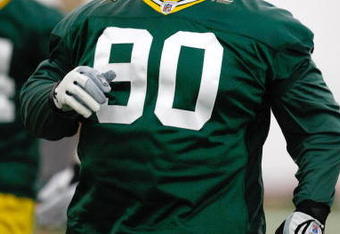 GREEN BAY, WI - MAY 1:  Defensive lineman B.J. Raji #90 runs as he participates in practice drills during Green Bay Packers Minicamp at Don Hutson Center on May 1, 2009 in Green Bay, Wisconsin. (Photo by Scott Boehm/Getty Images)