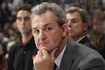 VANCOUVER - SEPTEMBER 30:  Head Coach Darryl Sutter of the Calgary Flames looks on against the Vancouver Canucks during their pre-season NHL game at General Motors Place on September 30, 2005 in Vancouver, Canada.   (Photo by Jeff Vinnick/Getty Images)