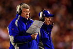LANDOVER, MD - DECEMBER 30:  Quarterbacks coach Kevin Gilbride (L) and head coach Tom Coughlin of the New York Giants look on from the sidelines against the Washington Redskins at FedEx Field on December 30, 2006 in Landover, Maryland.  (Photo by Jamie Squire/Getty Images)