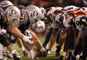 OAKLAND, CA - SEPTEMBER 8:  The Denver Broncos defense line up against the Oakland Raiders offense during the NFL game against the Oakland Raiders on September 8, 2008 at McAfee Coliseum in Oakland, California. The Broncos defeated the Raiders 41-14. (Photo by Jed Jacobsohn/Getty Images)