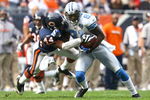 CHICAGO - NOVEMBER 02:  Wide receiver Calvin Johnson #81 of the Detroit Lions makes a reception and is brought down by Kevin Payne #44 of the Chicago Bears during the second quarter at Soldier Field on November 2, 2008 in Chicago, Illinois.  (Photo by Jeff Gross/Getty Images)