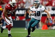 GLENDALE, AZ - JANUARY 18: Wide receiver Kevin Curtis #80 of the Philadelphia Eagles runs after making a catch as he runs by safety Adrian Wilson #24 of the Arizona Cardinals during the NFC championship game on January 18, 2009 at University of Phoenix Stadium in Glendale, Arizona. (Photo by Jamie Squire/Getty Images)