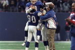 13 Dec 1998: Quarterback Kent Graham #10 of the New York Giants celebrates during the game against the Denver Broncos at Giants Stadium in East Rutherford, New Jersey. The Giants defeated the Broncos 21-16.