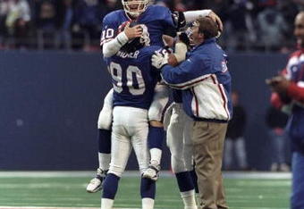 13 Dec 1998: Quarterback Kent Graham #10 of the New York Giants celebrates during the game against the Denver Broncos at Giants Stadium in East Rutherford, New Jersey. The Giants defeated the Broncos 21-16.