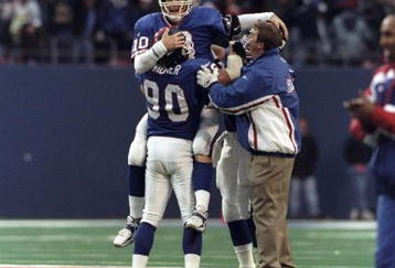 13 Dec 1998: Quarterback Kent Graham #10 of the New York Giants celebrates during the game against the Denver Broncos at Giants Stadium in East Rutherford, New Jersey. The Giants defeated the Broncos 21-16.