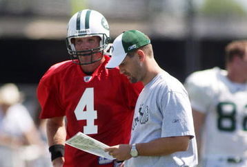 HEMPSTEAD, NY - AUGUST 09:  Quarterback Brett Favre #4 of the New York Jets speaks with Offensive Coordinator Brian Schottenheimer in his first day of Jets Training Camp at the team's facilities on August 9, 2008 in Hempstead, New York.  (Photo by Mike Stobe/Getty Images)
