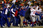 GREEN BAY, WI - JANUARY 20:  Head coach Tom Coughlin and the New York Giants celebrate as the winning field goal is kicked in overtime of the NFC championship game against the Green Bay Packers on January 20, 2008 at Lambeau Field in Green Bay, Wisconsin. The Giants defeated the Packers 23-20 in overtime to advance to the Superbowl XLII.  (Photo by Jamie Squire/Getty Images)