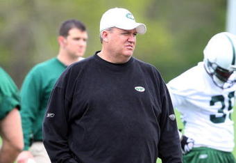 FLORHAM PARK, NJ - MAY 02:  Head coach Rex Ryan of the New York Jets walks on the field during minicamp on May 2, 2009 at the Atlantic Health Jets Training Center in Florham Park, New Jersey.  (Photo by Jim McIsaac/Getty Images)