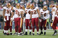 SEATTLE - NOVEMBER 23: London Fletcher #59 of the Washington Redskins leads the huddle during the game against the Seattle Seahawks on November 23, 2008 at Qwest Field in Seattle, Washington. (Photo by Otto Greule Jr/Getty Images)