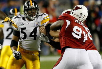 TAMPA, FL - FEBRUARY 01:  Special teams player Andre Frazier #54 of the Pittsburgh Steelers attempts to get by Kenny Iwebema #91 of the Arizona Cardinals during a punt in Super Bowl XLIII on February 1, 2009 at Raymond James Stadium in Tampa, Florida.  (Photo by Kevin C. Cox/Getty Images)