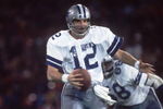 1979:  Quarterback Roger Staubach #12 of the Dallas Cowboys rolls out of the pocket during a Cowboys game in the 1979 season.   Mandatory Credit: Allsport/ALLSPORT