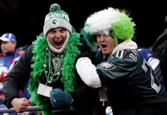 EAST RUTHERFORD, NJ - JANUARY 11:  Fans of the Philadelphia Eagles celebrate against the New York Giants during the NFC Divisional Playoff Game on January 11, 2009 at Giants Stadium in East Rutherford, New Jersey.  (Photo by Michael Heiman/Getty Images)