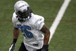 ALLEN PARK, MI - MAY 01:  Louis Delmas #26 of the Detroit Lions looks for a pass during rookie orientation camp at the Detroit Lions Headquarters and Training Facility on May 1, 2009 in Allen Park, Michigan.  (Photo by Gregory Shamus/Getty Images)