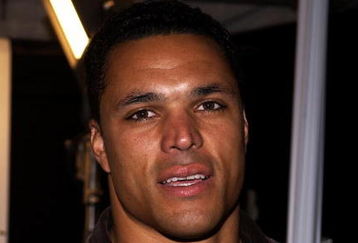 SANTA MONICA, CA - MAY 5:  Football player Tony Gonzales arrives at the cocktail party to announce the new collaberation between watch manufacturer IWC and car manufacturer Mercedes-AMG  and the launch event for their new product, The Ingenieur,  at Santa Monica Municipal Airport, Hangar 8 on May 5, 2005 in Santa Monica, California. (Photo by Amanda Edwards/Getty Images)