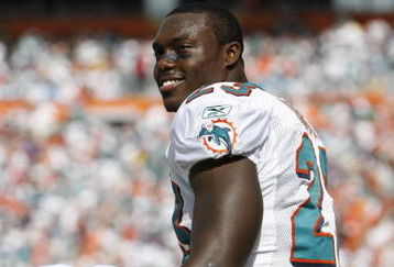 MIAMI - JANUARY 4:  Ronnie Brown #23 of the Miami Dolphins looks on during a AFC Wild Card playoff game against the Baltimore Ravens on January 4, 2009 at Dolphin Stadium in Miami, Florida. (Photo by Gregory Shamus/Getty Images)