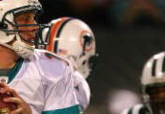 EAST RUTHERFORD, NJ - DECEMBER 28:  Chad Pennington #10 of The Miami Dolphins looks to pass against the New York Jets during their game on December 28, 2008 at Giants Stadium in East Rutherford, New Jersey.  (Photo by Al Bello/Getty Images)