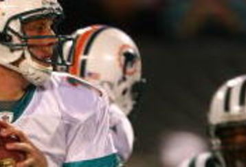 EAST RUTHERFORD, NJ - DECEMBER 28:  Chad Pennington #10 of The Miami Dolphins looks to pass against the New York Jets during their game on December 28, 2008 at Giants Stadium in East Rutherford, New Jersey.  (Photo by Al Bello/Getty Images)