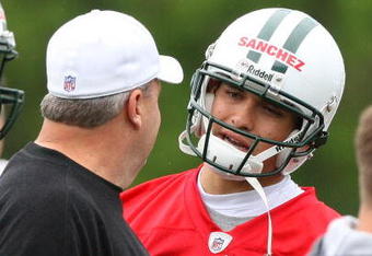 FLORHAM PARK, NJ - MAY 02:  Quarterback Mark Sanchez #6 of the New York Jets talks with head coach Rex Ryan during minicamp on May 2, 2009 at the Atlantic Health Jets Training Center in Florham Park, New Jersey.  (Photo by Jim McIsaac/Getty Images)
