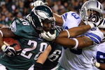 PHILADELPHIA - DECEMBER 28:  Correll Buckhalter #28 of the Philadelphia Eagles runs the ball against Anthony Spencer #93 of the Dallas Cowboys on December 28, 2008 at Lincoln Financial Field in Philadelphia, Pennsylvania. The Eagles defeated the Cowboys 44-6.  (Photo by Jim McIsaac/Getty Images)