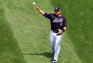 NEW YORK - MAY 13:  Omir Santos #9 of the New York Mets warms up before playing against the Atlanta Braves on May 13, 2009 at Citi Field in the Flushing neighborhood of the Queens borough of New York City. The Braves defeated the Mets 8-7 in twelve innings.  (Photo by Jim McIsaac/Getty Images)