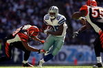 IRVING, TX - OCTOBER 05:  Running back Felix Jones #28 of the Dallas Cowboys runs past Leon Hall #29 of the Cincinnati Bengals at Texas Stadium on October 5, 2008 in Irving, Texas.  (Photo by Ronald Martinez/Getty Images)