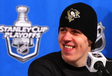 RALEIGH, NC - MAY 23:  Evgeni Malkin #71 of the Pittsburgh Penguins smiles as he talks to the media after their 6-2 win over the Carolina Hurricanes in Game Three of the Eastern Conference Championship Round of the 2009 Stanley Cup Playoffs at RBC Center on May 23, 2009 in Raleigh, North Carolina.  (Photo by Jim McIsaac/Getty Images)