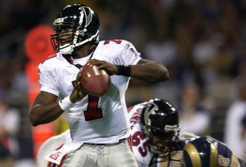 6 Jan 2002: Quarterback Michael Vick #7 of the Atlanta Falcons looks to pass against the St. Louis Rams at the Dome at America's Center in St. Louis, Missouri. DIGITAL IMAGE. Mandatory Credit: Elsa /Getty Images