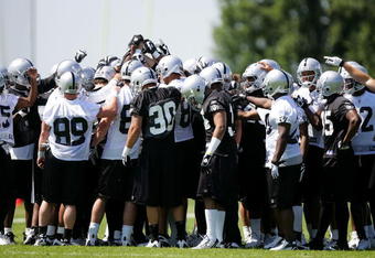 ALAMEDA, CA - MAY 08:  The Oakland Raiders huddle together during the Raiders minicamp at the team's permanent training facility on May 8, 2009 in Alameda, California.  (Photo by Ezra Shaw/Getty Images)