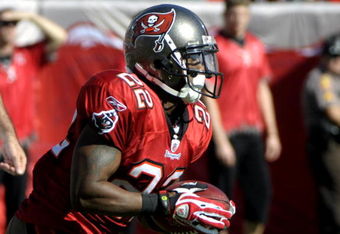 TAMPA, FL - DECEMBER 21: Running back Clifton Smith #22 of the Tampa Bay Buccaneers returns a kick against the San Diego Chargers at Raymond James Stadium on December 21, 2008 in Tampa, Florida.  (Photo by Al Messerschmidt/Getty Images)