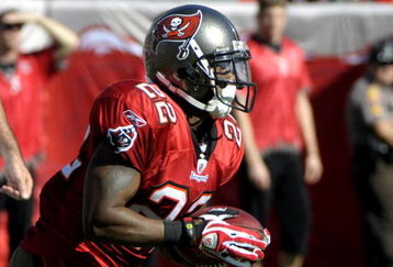 TAMPA, FL - DECEMBER 21: Running back Clifton Smith #22 of the Tampa Bay Buccaneers returns a kick against the San Diego Chargers at Raymond James Stadium on December 21, 2008 in Tampa, Florida.  (Photo by Al Messerschmidt/Getty Images)