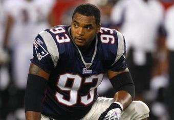 FOXBORO, MA - AUGUST 7: Richard Seymour #93 of the New England Patriots looks on while resting on his right knee against the Baltimore Ravens during the preseason game at Gillette Stadium on August 7, 2008 in Foxboro, Massachusetts. (Photo by Jim Rogash/Getty Images)