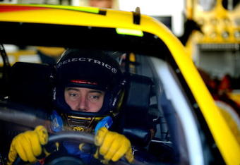 DOVER, DE - MAY 30:  Kyle Busch sits in the #18 M&M's Toyota, during practice for the NASCAR Sprint Cup Series Autism Speaks 400 at Dover International Speedway on May 30, 2009 in Dover, Delaware.  (Photo by Jeff Zelevansky/Getty Images for NASCAR)