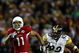 TAMPA, FL - FEBRUARY 01: Larry Fitzgerald #11 of the Arizona Cardinals runs for a touchdown after a catch against James Harrison #92 of the Pittsburgh Steelers in the fourth quarter during Super Bowl XLIII on February 1, 2009 at Raymond James Stadium in Tampa, Florida. (Photo by Chris McGrath/Getty Images)