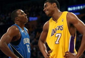 LOS ANGELES - JANUARY 16:  Andrew Bynum #17 of the Los Angeles Lakers and Dwight Howard #12 of the Orlando Magic look on during a break in their NBA game on January 16, 2009 at Staples Center in Los Angeles, California. The Magic won 109-103.   NOTE TO USER: User expressly acknowledges and agrees that, by downloading and/or using this Photograph, user is consenting to the terms and conditions of the Getty Images License Agreement. (Photo by Stephen Dunn/Getty Images)