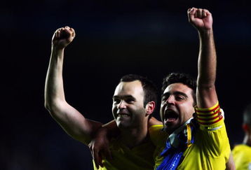LONDON, ENGLAND - MAY 06:  (L-R)  Andres Iniesta and Xavi of Barcelona celebrate victory in the UEFA Champions League Semi Final match between Chelsea and Barcelona at Stamford Bridge on May 6, 2009 in London, England.  (Photo by Jamie McDonald/Getty Images)