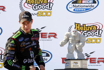 DOVER, DE - MAY 30:  Brad Keselowski, driver of the #88 GoDaddy.com Chevrolet, poses with the trophy after winning the NASCAR Nationwide Series Heluva Good! 200 at Dover International Speedway on May 30, 2009 in Dover, Delaware.  (Photo by Jason Smith/Getty Images for NASCAR)