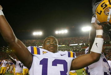 AUBURN, AL - SEPTEMBER 20:  Defensive back Ron Brooks #13 of the LSU Tigers celebrates after defeating the Auburn Tigers at Jordan-Hare Stadium on September 20, 2008 in Auburn, Alabama. LSU defeated Auburn 26-21.  (Photo by Doug Benc/Getty Images)