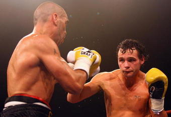 BRISBANE, AUSTRALIA - MAY 27:  Daniel Geale lines up Anthony Mundine during the IBO middleweight world title fight between Anthony Mundine and Daniel Geale at the Brisbane Entertainment Centre on May 27, 2009 in Brisbane, Australia.  (Photo by Bradley Kanaris/Getty Images)