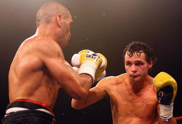 BRISBANE, AUSTRALIA - MAY 27:  Daniel Geale lines up Anthony Mundine during the IBO middleweight world title fight between Anthony Mundine and Daniel Geale at the Brisbane Entertainment Centre on May 27, 2009 in Brisbane, Australia.  (Photo by Bradley Kanaris/Getty Images)