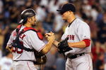 NEW YORK - JULY 03:  Jason Varitek #33 of the Boston Red Sox congratulates teammate Jon Lester #31 after Lester shutout the New York Yankees 7-0 on July 3, 2008 at Yankee Stadium in the Bronx borough of New York City.  (Photo by Jim McIsaac/Getty Images)