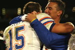 MIAMI - JANUARY 08:  Head coach Urban Meyer and Tim Tebow #15 of the Florida Gators celebrate after their 24-14 win against the Oklahoma Sooners during the FedEx BCS National Championship game at Dolphin Stadium on January 8, 2009 in Miami, Florida.  (Photo by Marc Serota/Getty Images)