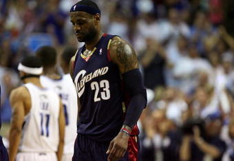 ORLANDO, FL - MAY 30: LeBron James #23 of the Cleveland Cavaliers walks toward the bench against the Orlando Magic in Game Six of the Eastern Conference Finals during the 2009 Playoffs at Amway Arena on May 30, 2009 in Orlando, Florida. NOTE TO USER: User expressly acknowledges and agrees that, by downloading and or using this photograph, User is consenting to the terms and conditions of the Getty Images License Agreement  (Photo by Elsa/Getty Images)