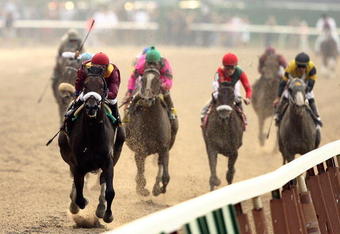 ELMONT, NY - JUNE 07:  Da'Tara ridden by jockey Alan Garcia comes down the final stretch on his way to winning the 140th running of the Belmont Stakes at Belmont Park on June 7, 2008 in Elmont, New York.  (Photo by Al Bello/Getty Images)