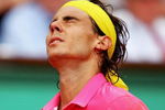 PARIS - MAY 31:  A dejected Rafael Nadal of Spain reacts as he heads towards defeat during the Men's Singles Fourth Round match against Robin Soderling of Sweden on day eight of the French Open at Roland Garros on May 31, 2009 in Paris, France.  (Photo by Clive Brunskill/Getty Images)