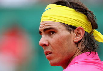 PARIS - MAY 31:  Rafael Nadal of Spain looks on during the Men's Singles Fourth Round match against Robin Soderling of Sweden on day eight of the French Open at Roland Garros on May 31, 2009 in Paris, France.  (Photo by Clive Brunskill/Getty Images)