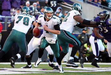 BALTIMORE - NOVEMBER 23:  Kevin Kolb #4 of the Philadelphia Eagles scrambles against the Baltimore Ravens on November 23, 2008 at M&T Bank Stadium in Baltimore, Maryland. The Ravens defeated the Eagles 36-7.  (Photo by Jim McIsaac/Getty Images)