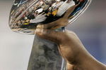 DETROIT - FEBRUARY 05:  Barrett Brooks #72 of the Pittsburgh Steelers celebrates with the Vince Lombardi Trophy after defeating the Seattle Seahawks in Super Bowl XL at Ford Field on February 5, 2006 in Detroit, Michigan. The Steelers defeated the Seahawks 21-10.  (Photo by Jonathan Daniel/Getty Images)