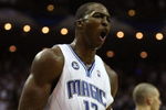 ORLANDO, FL - MAY 30:  Dwight Howard #12 of the Orlando Magic reacts after a play late in the game against the Cleveland Cavaliers in Game Six of the Eastern Conference Finals during the 2009 Playoffs at Amway Arena on May 30, 2009 in Orlando, Florida. NOTE TO USER: User expressly acknowledges and agrees that, by downloading and or using this photograph, User is consenting to the terms and conditions of the Getty Images License Agreement  (Photo by Elsa/Getty Images)